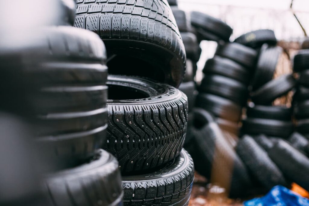 Tires stacked in a mechanic's