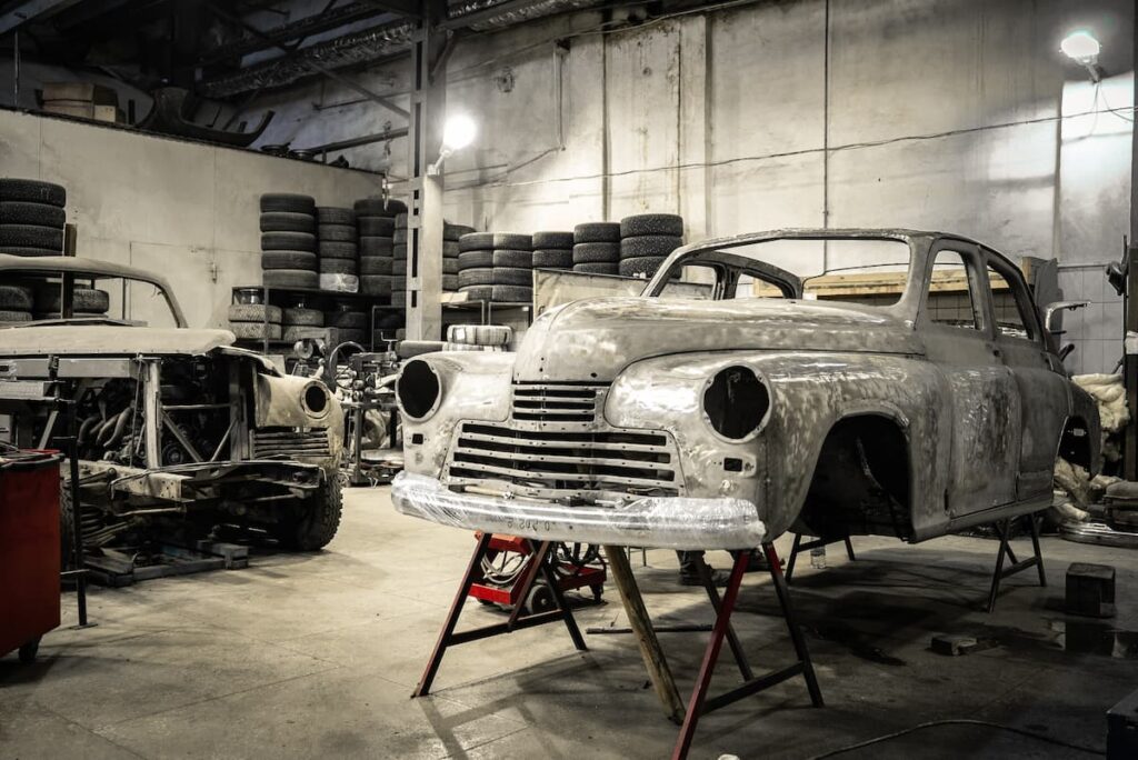 Old car being recovered at a car recycling company