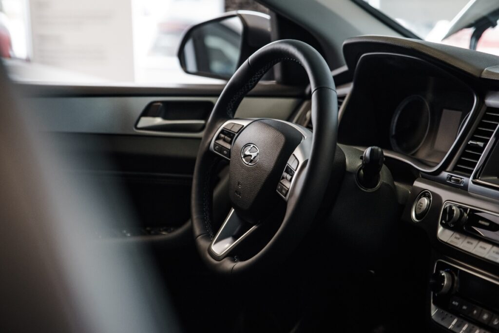 Steering wheel and dashboard of a car.